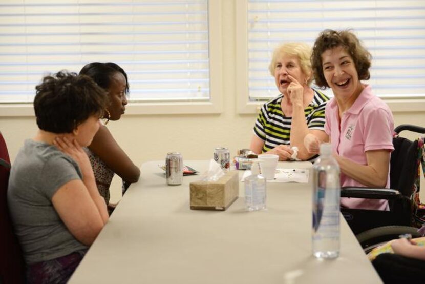 
Kelly Riney (far left), Dominique Cooper (middle left), Linda Walls (middle right) and her...