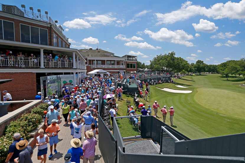 Fans walk along the 18th hole during the final round of Fort Worth Invitational at Colonial...