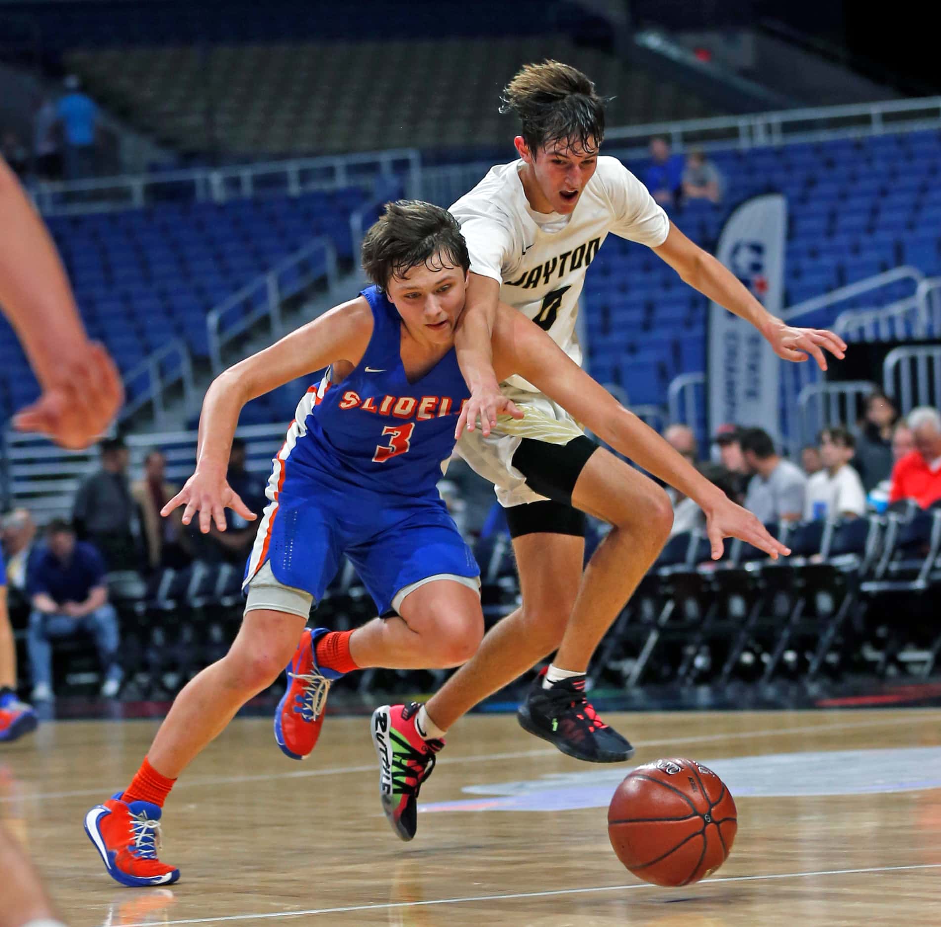 Slidell guard Brock Harwell #3 goes for a loose ball with Jayton center Alex Chisum #4....