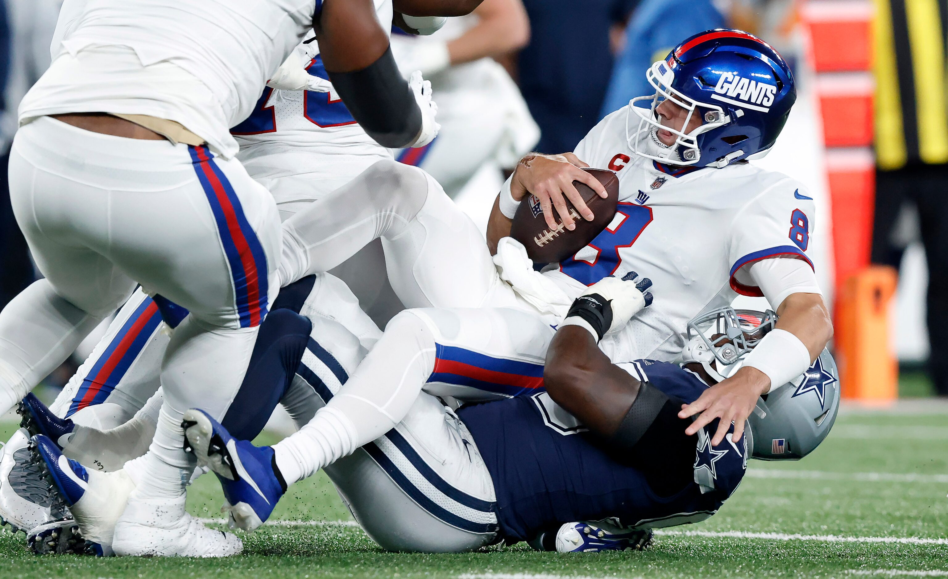 Dallas Cowboys defensive end DeMarcus Lawrence (90) sacks New York Giants quarterback Daniel...