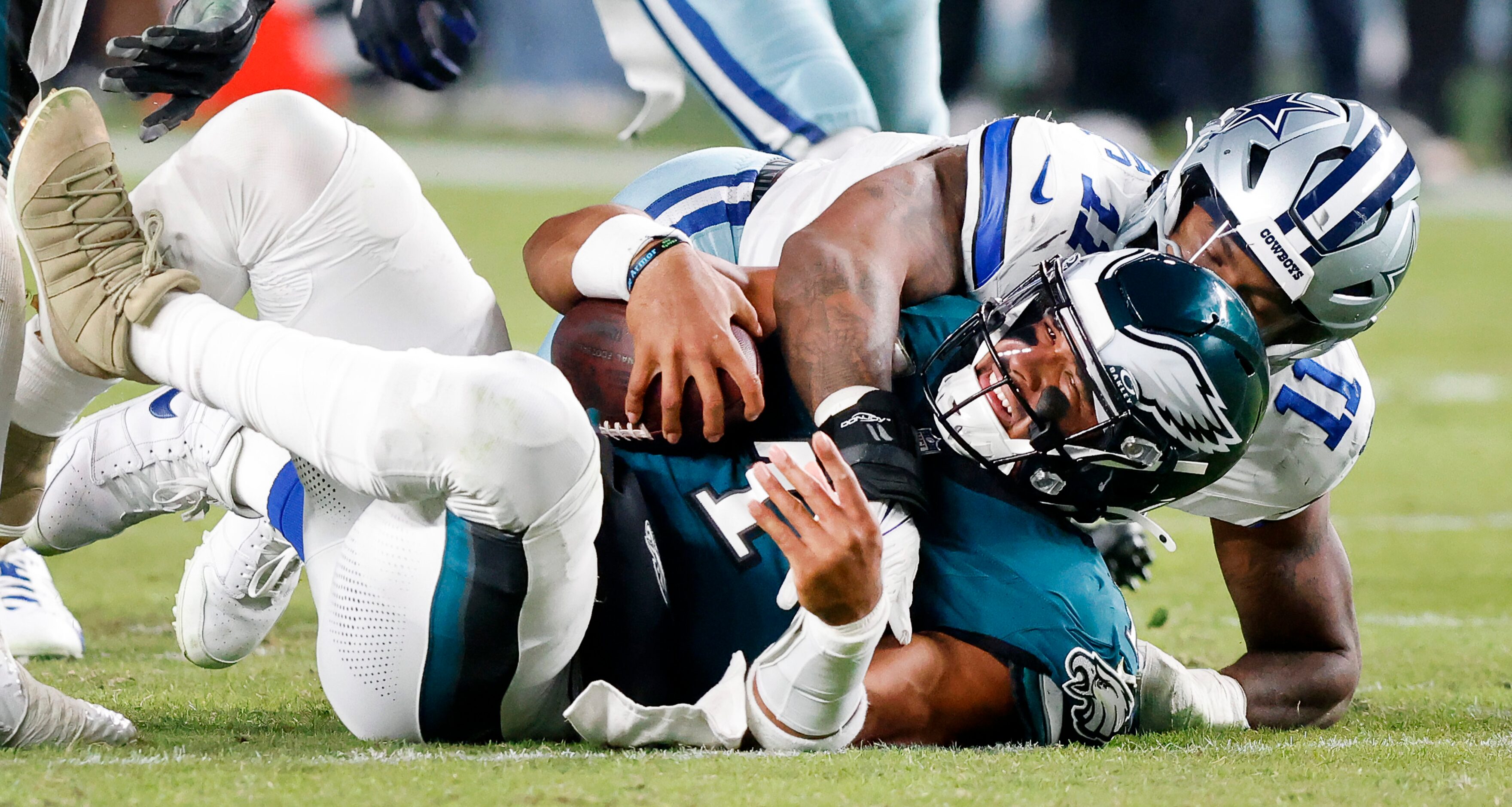 Dallas Cowboys linebacker Micah Parsons (11) sacks Philadelphia Eagles quarterback Jalen...