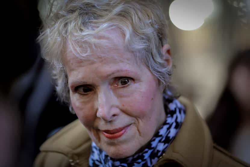 FILE - E. Jean Carroll talks to reporters outside a courthouse in New York on March 4, 2020....