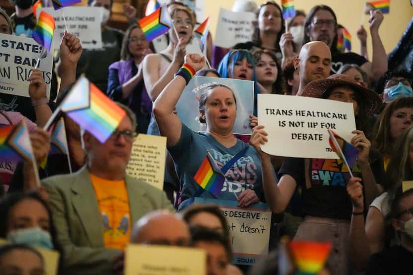 LGBTQ activists protest Senate Bill 14, a ban on gender-affirming medical care for...