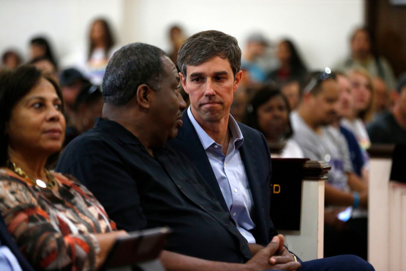 Beto O'Rourke talked to state Sen. Royce West (left) before speaking to the crowd during...
