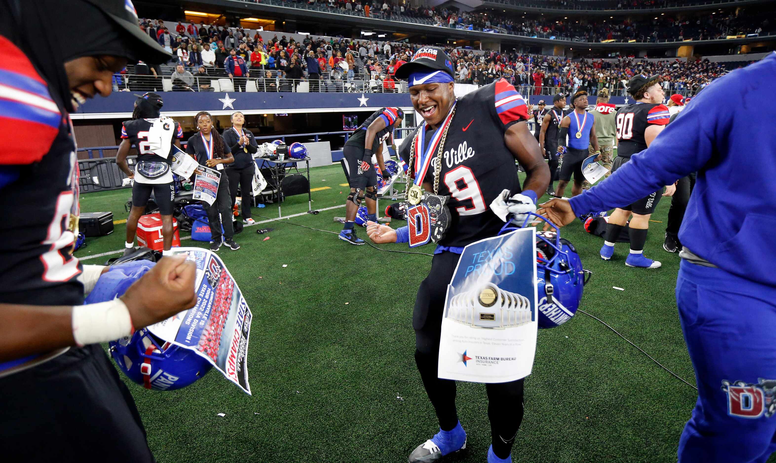 Duncanville running back Kaleb Kenney (9) and his teammates celebrate their Class 6A...