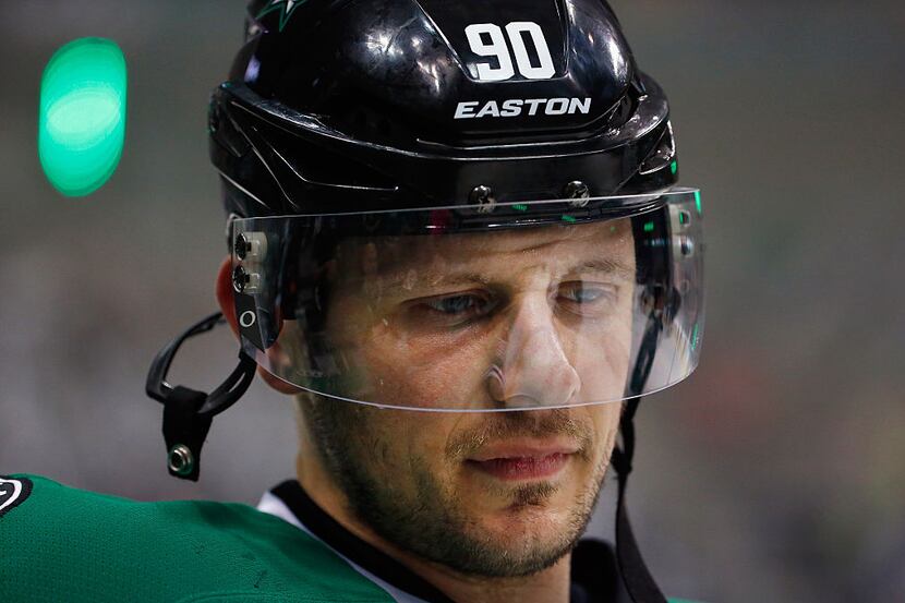 DALLAS, TX - MARCH 23:  Jason Spezza #90 of the Dallas Stars skates during pregame warm up...