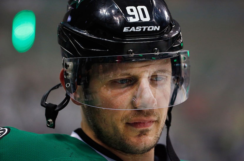 DALLAS, TX - MARCH 23:  Jason Spezza #90 of the Dallas Stars skates during pregame warm up...