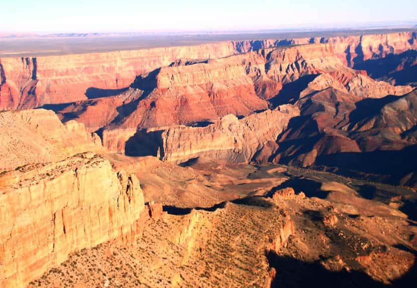 
Maverick Helicopter Tours fly over the canyon and passengers get a bird’s-eye view of pink,...