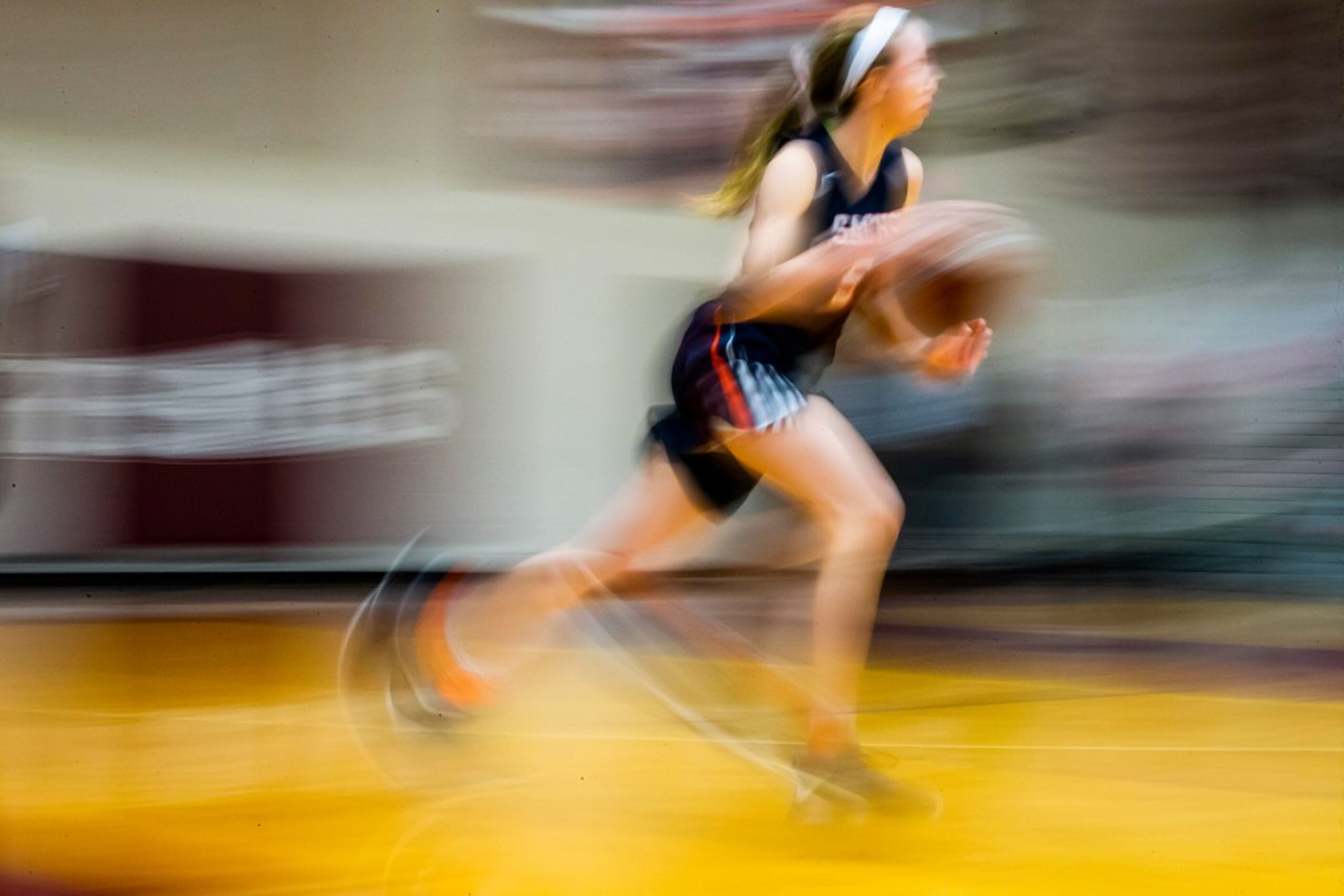 Sachse guard Avery Crouse brings the ball up the court during a District 10-6A girls...