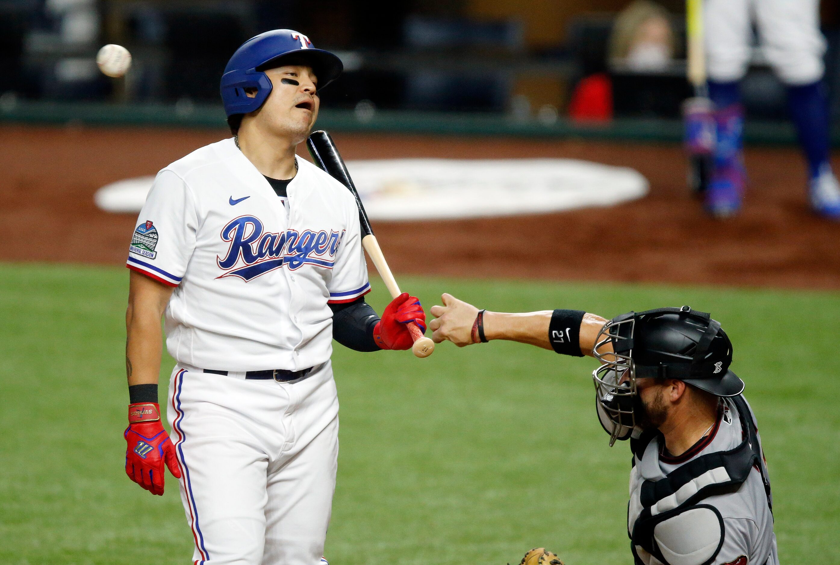 Texas Rangers left fielder Shin-Soo Choo (17) reacts to a called strike during the third...