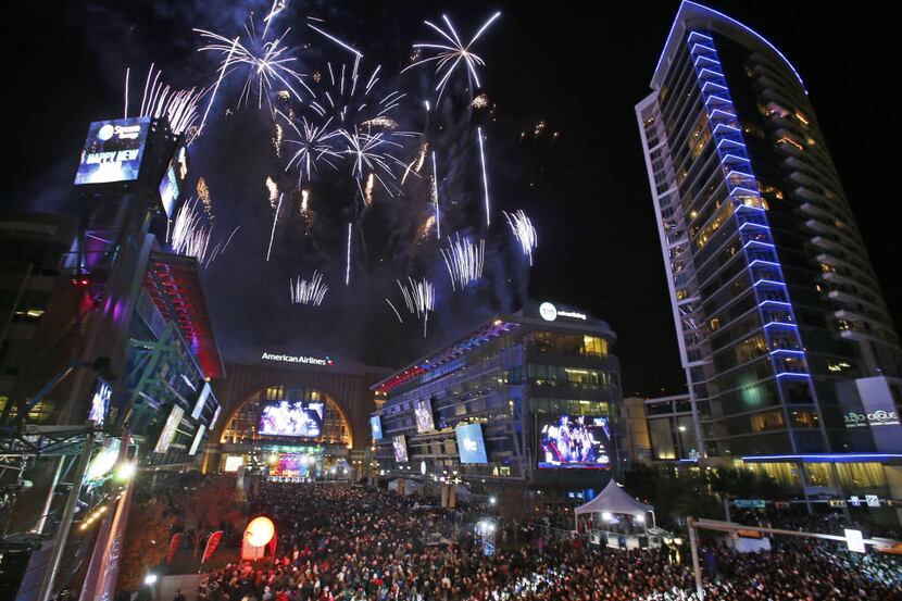 The fireworks fill the sky as the calendar turns over to 2014 at the Big D New Year's Eve...