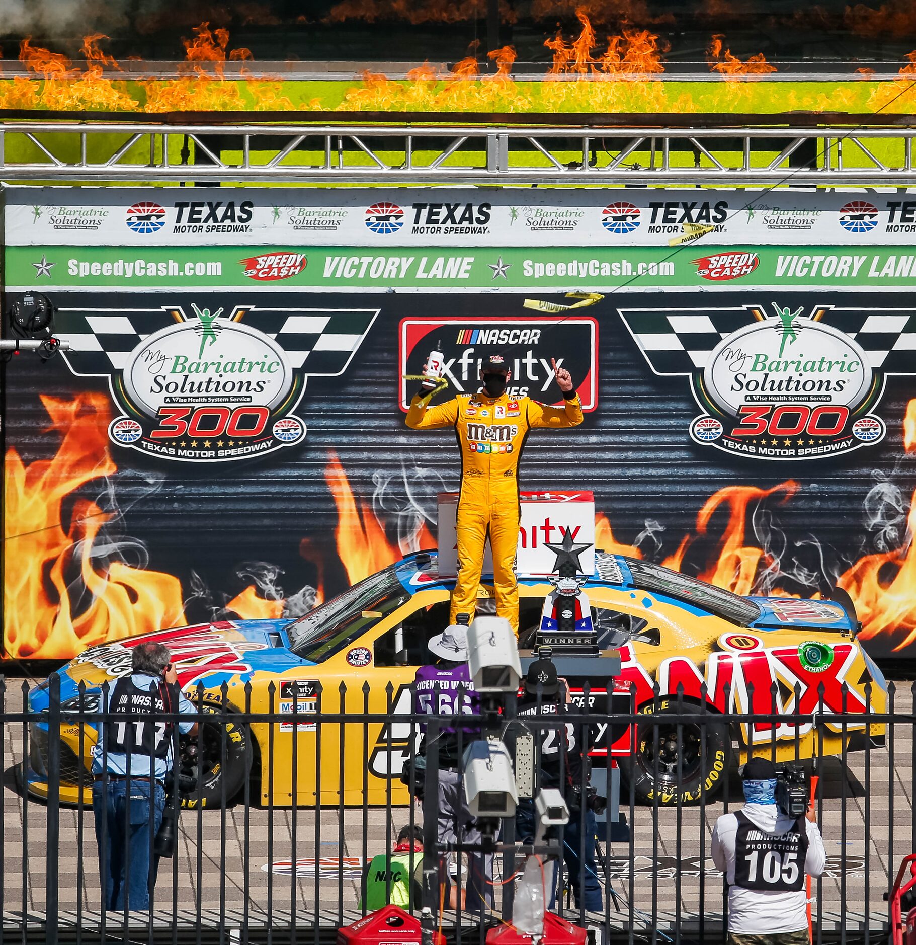 NASCAR Xfinity's Kyle BuschÕs, No. 54, celebrates in Victory Lane after winning the My...