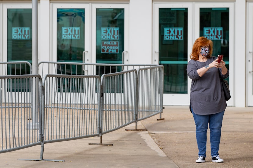 Melissa Warfield takes a selfie after voting at the Allen Event Center in Allen on Thursday,...