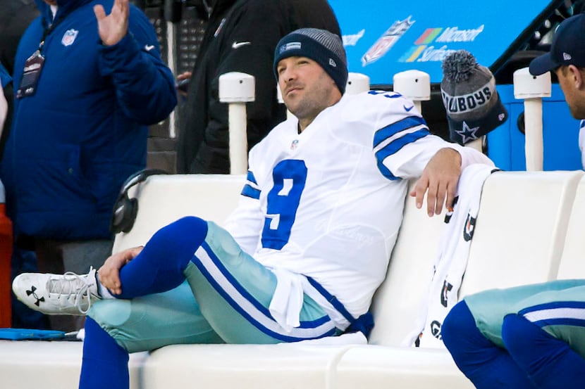 Dallas Cowboys quarterback Tony Romo (9) sits on the bench during the second half of an NFL...