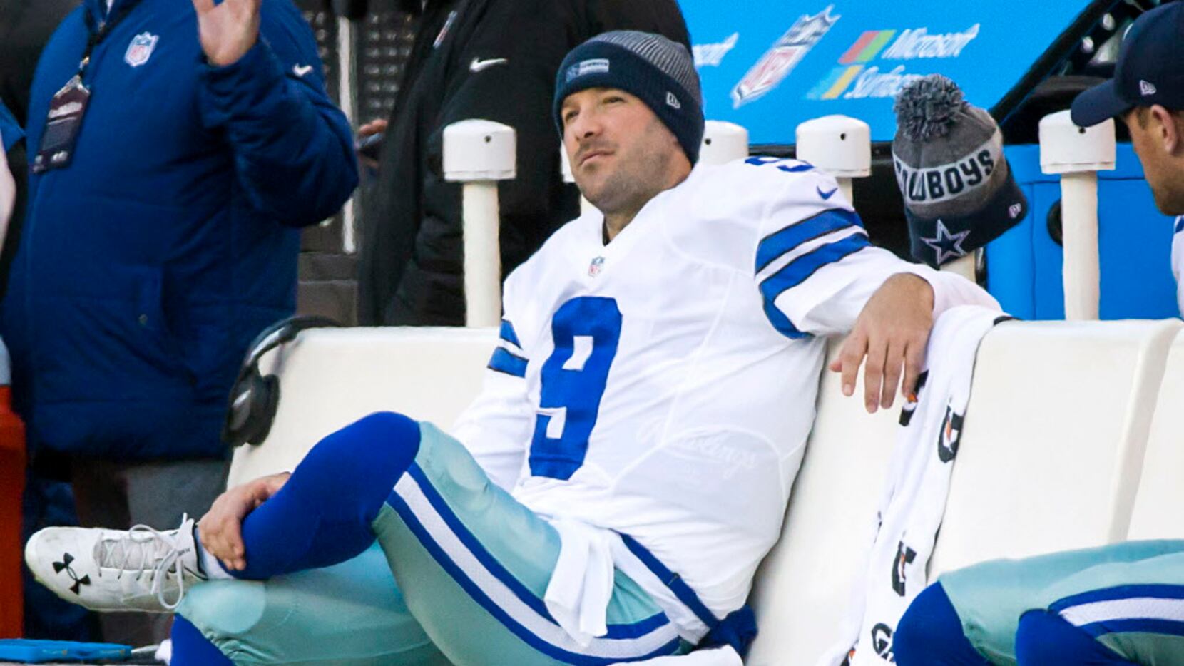 Dallas Cowboys quarterback Tony Romo (9) sits on the bench during the second half of an NFL...