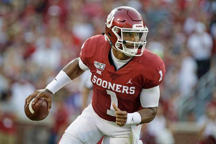 NORMAN, OK - SEPTEMBER 07: Quarterback Jalen Hurts #1 of the Oklahoma Sooners scrambles...