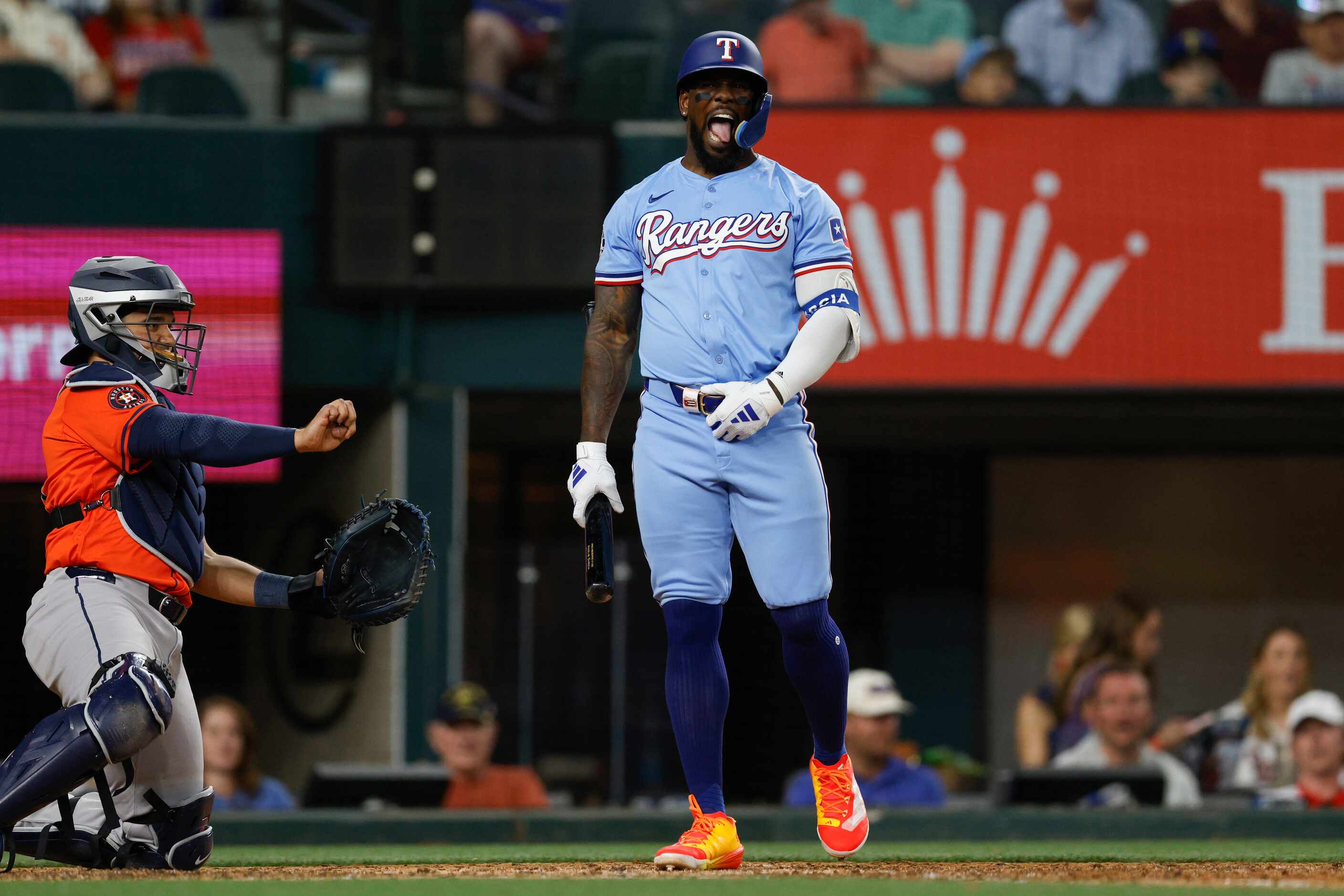 Texas Rangers right fielder Adolis García (53) reacts after a called strike during the ninth...