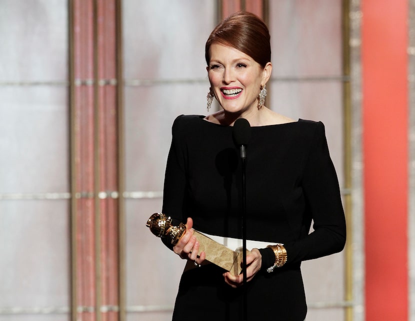 In this Jan. 13, 2013 photo, Julianne Moore, winner of the award for best actress in a...