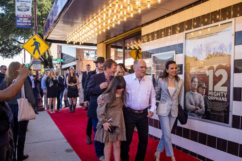 Actor Robert Duvall, center, attends the premiere of “12 Mighty Orphans” held at the ISIS...