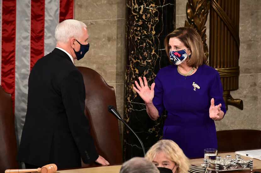 Speaker of the House Nancy Pelosi, D-Calif., and Vice President Mike Pence officiate as a...