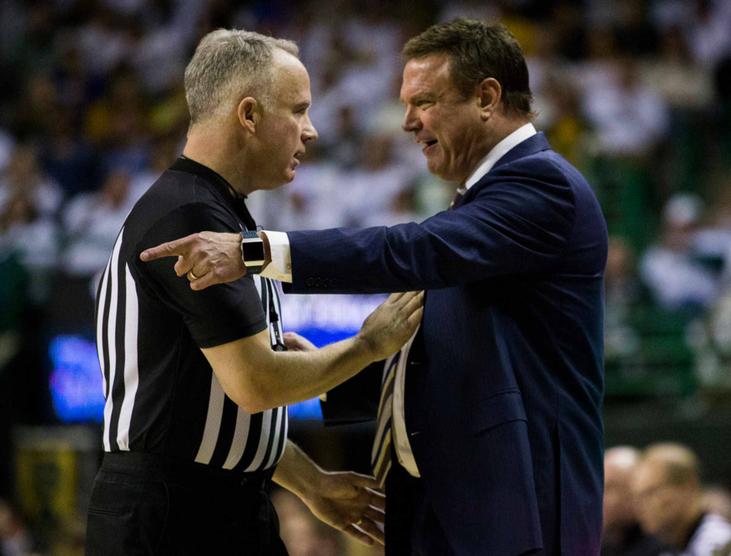 Kansas Jayhawks head coach Bill Self disputes a call during the first half of an NCAA men's...