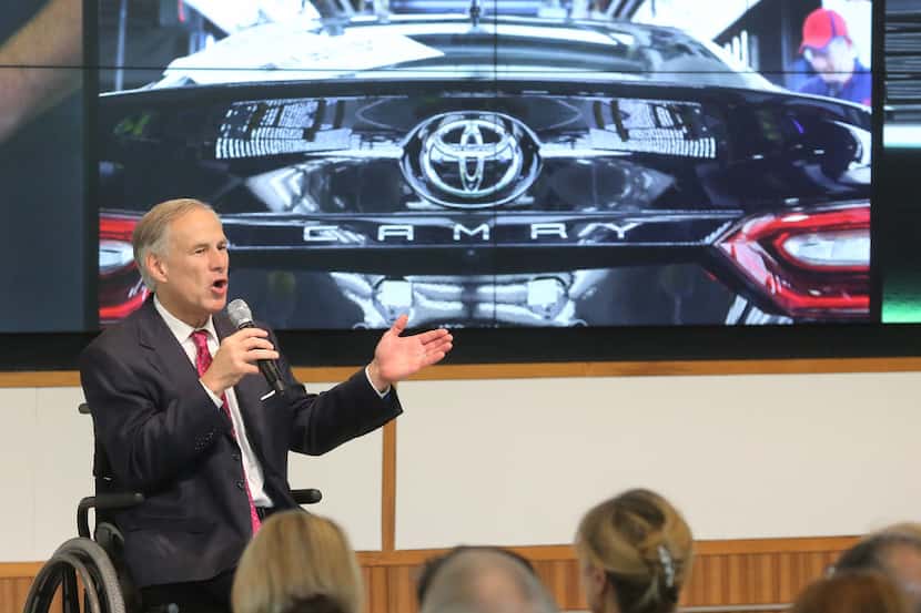 Texas Gov. Greg Abbott, shown at a 2017 grand opening ceremony for the Toyota headquarters...
