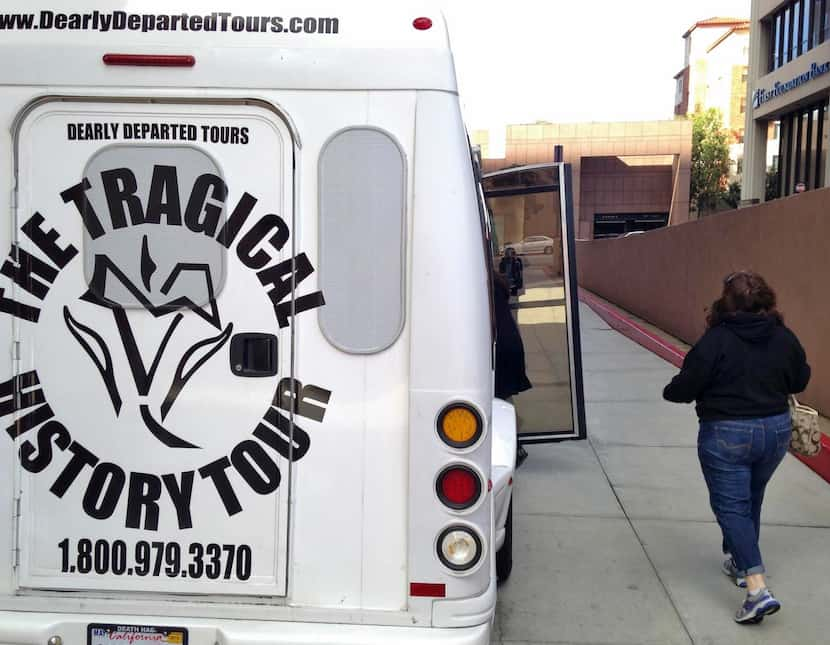 
The Dearly Departed tour bus carries 13 passengers on a three-hour tour of death sites in...