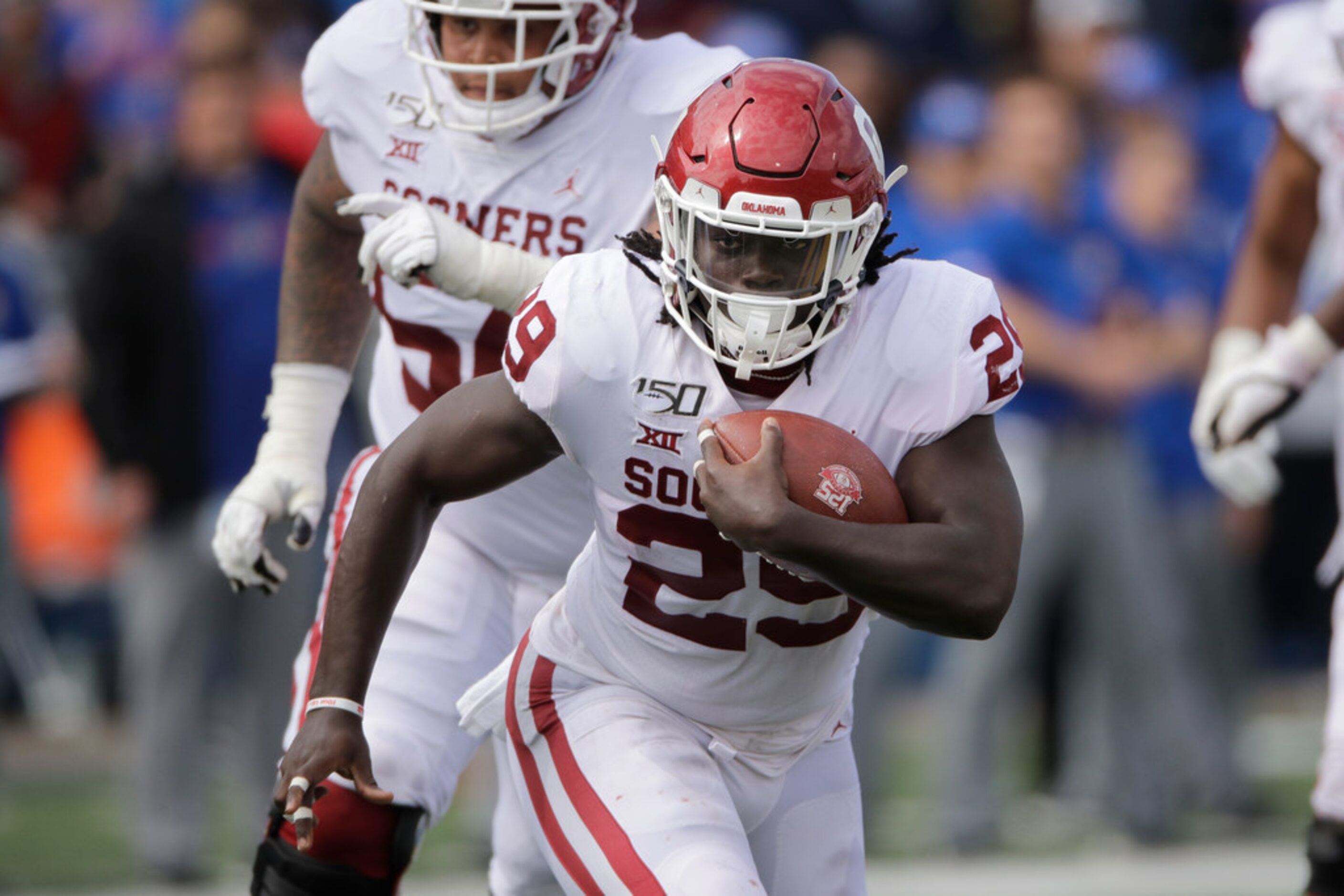 Oklahoma running back Rhamondre Stevenson runs for a touchdown during the second half of an...