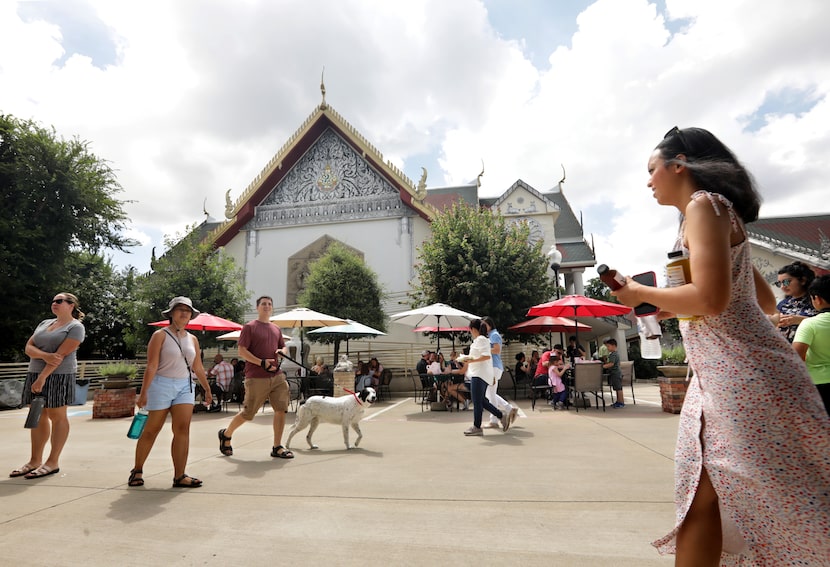 Guests enjoy the food and atmosphere during the Sunday Thai Food Market.