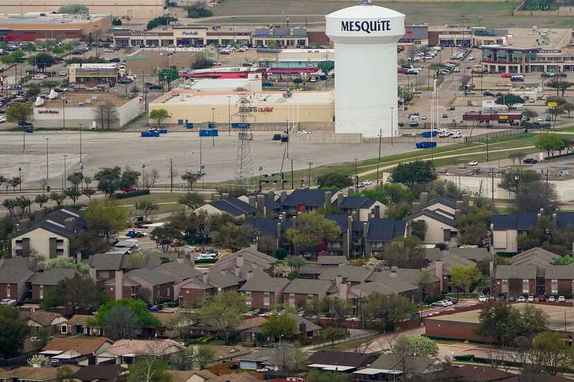Aerial view of water tower and retail businesses along North Town East Boulevard in Mesquite.