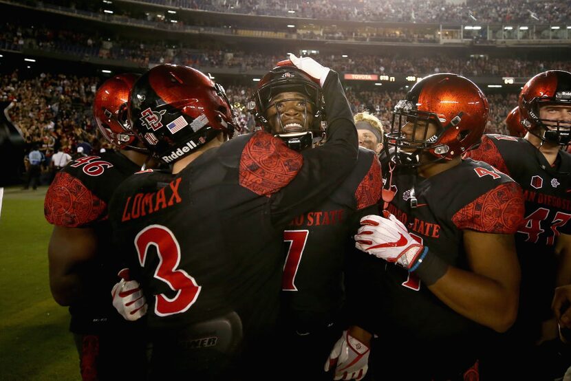 SAN DIEGO, CA - SEPTEMBER 16:   Trey Lomax #3 hugs Kameron Kelly #7 of the San Diego State...