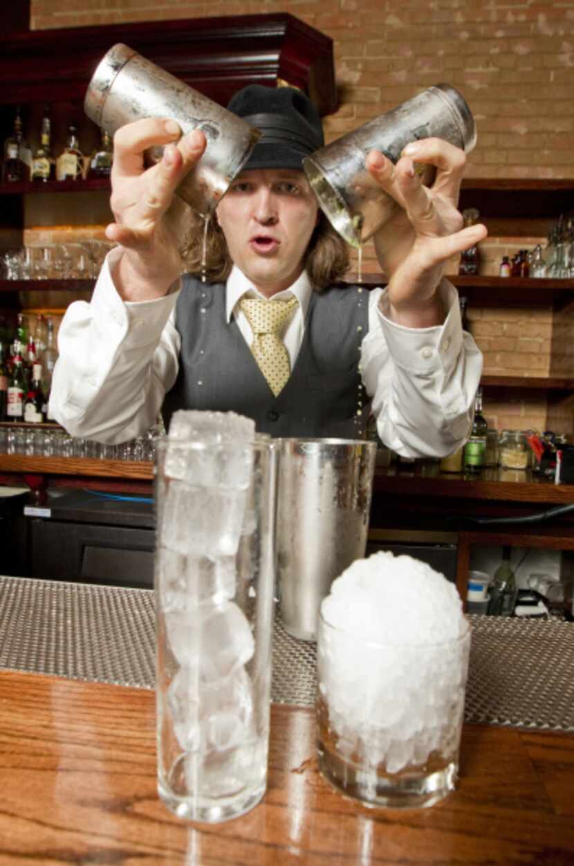 Eddie "Lucky" Campbell mixes a Bottle Rocket cocktail at The Chesterfield in downtown...