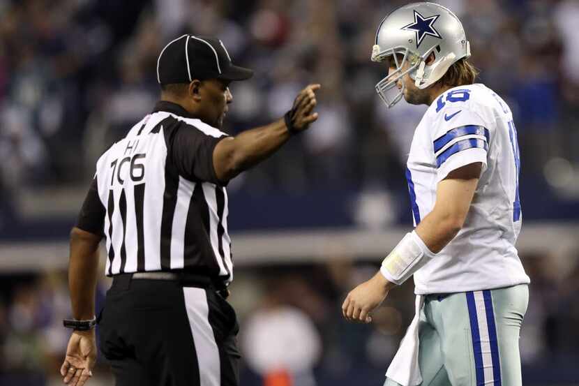 Dallas Cowboys quarterback Kyle Orton (18) walks back to the sideline after throwing an...