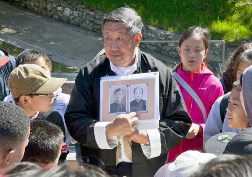 
Guide Sam Louie tells visitors the history of Angel Island and impersonates his father, a...