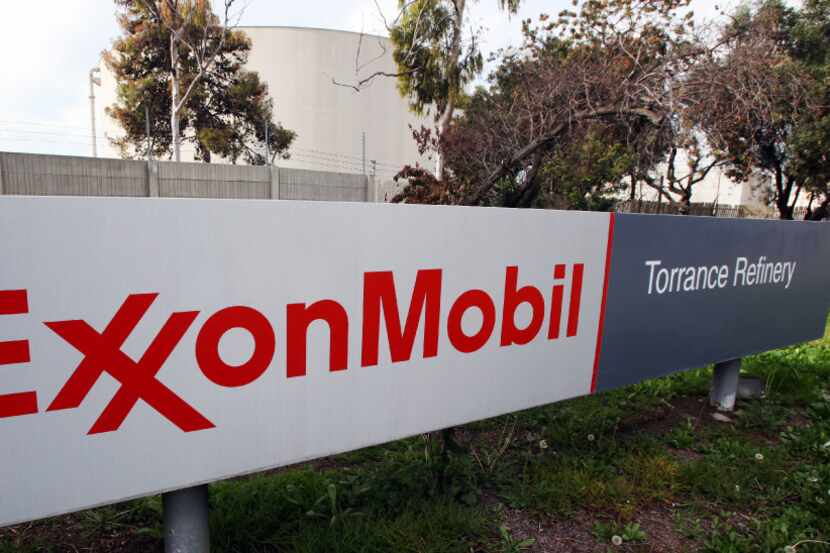 FILE - This Jan. 30, 2012, file photo shows the sign for the Exxon Mobil Torrance Refinery...