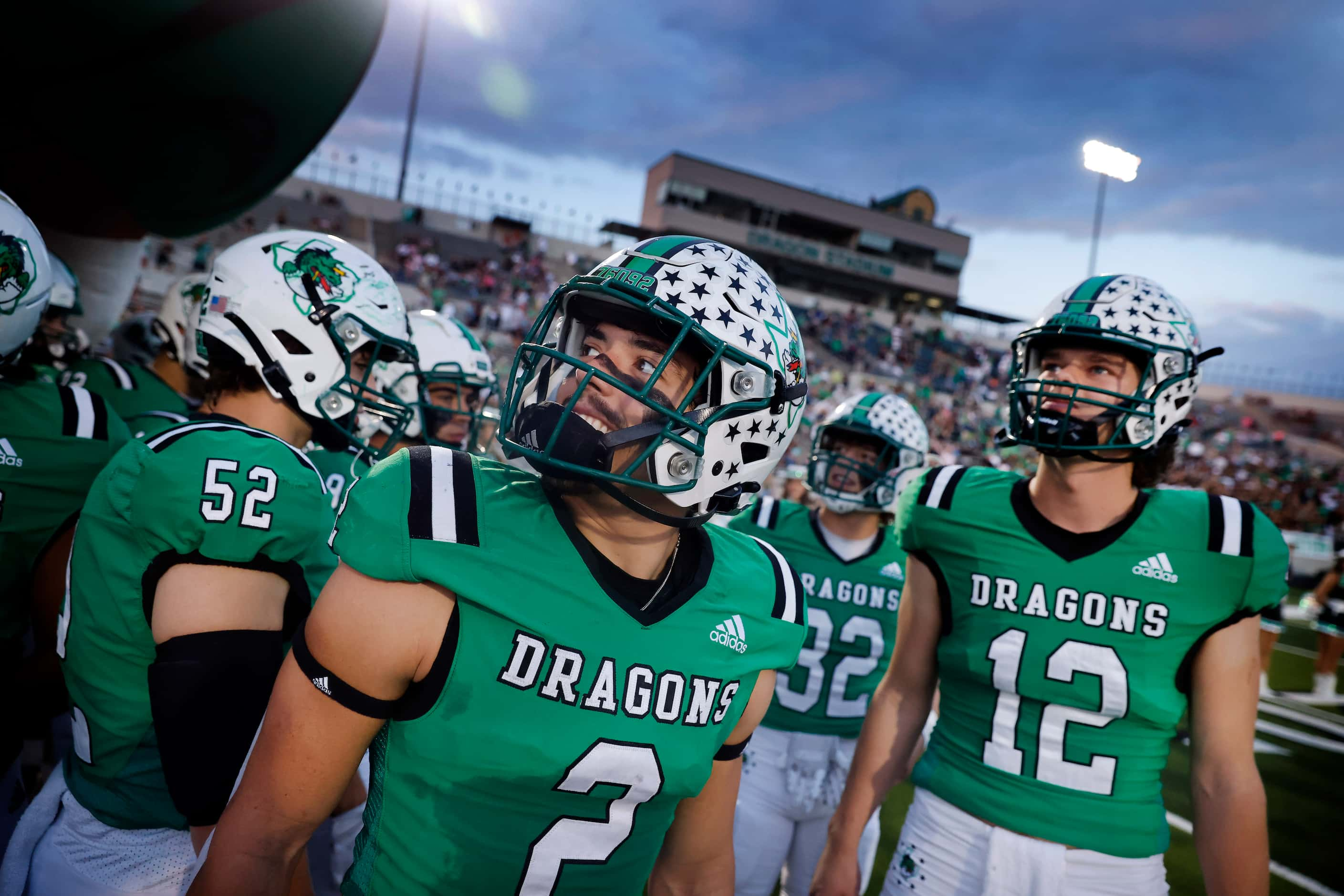 Southlake Carroll quarterback Kaden Anderson (12) and running back Owen Allen (2) watch the...