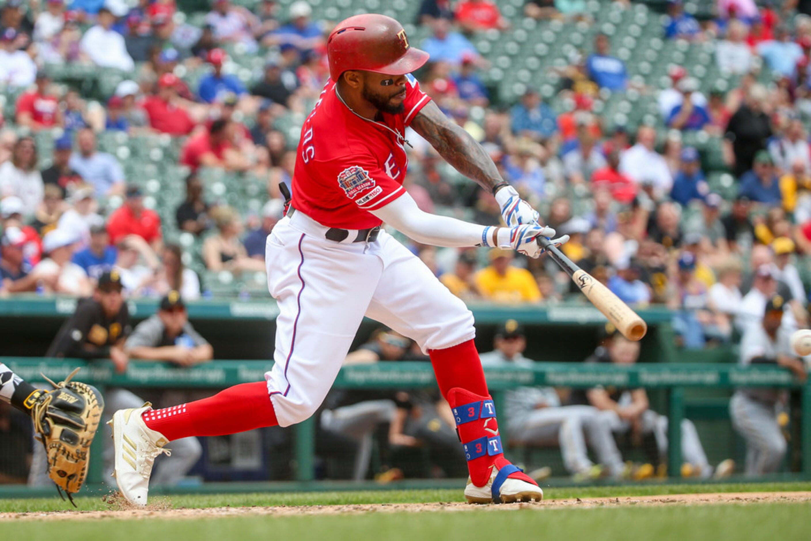 Texas Rangers left fielder Delino DeShields (3) bats during a Major League Baseball game at...