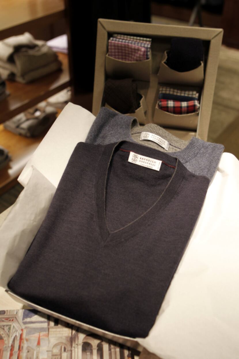 A Brunello Cucinelli cashmere V-neck sweater was selling for $645, and a sweat shirt for...
