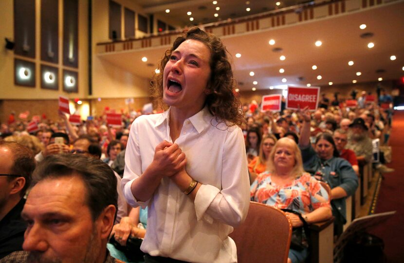 Jackie Denning of Dallas gets emotional as she expresses her concern about comments from...