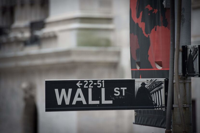 (FILES) This file photo taken on November 9, 2016 shows the the Wall street sign near the...