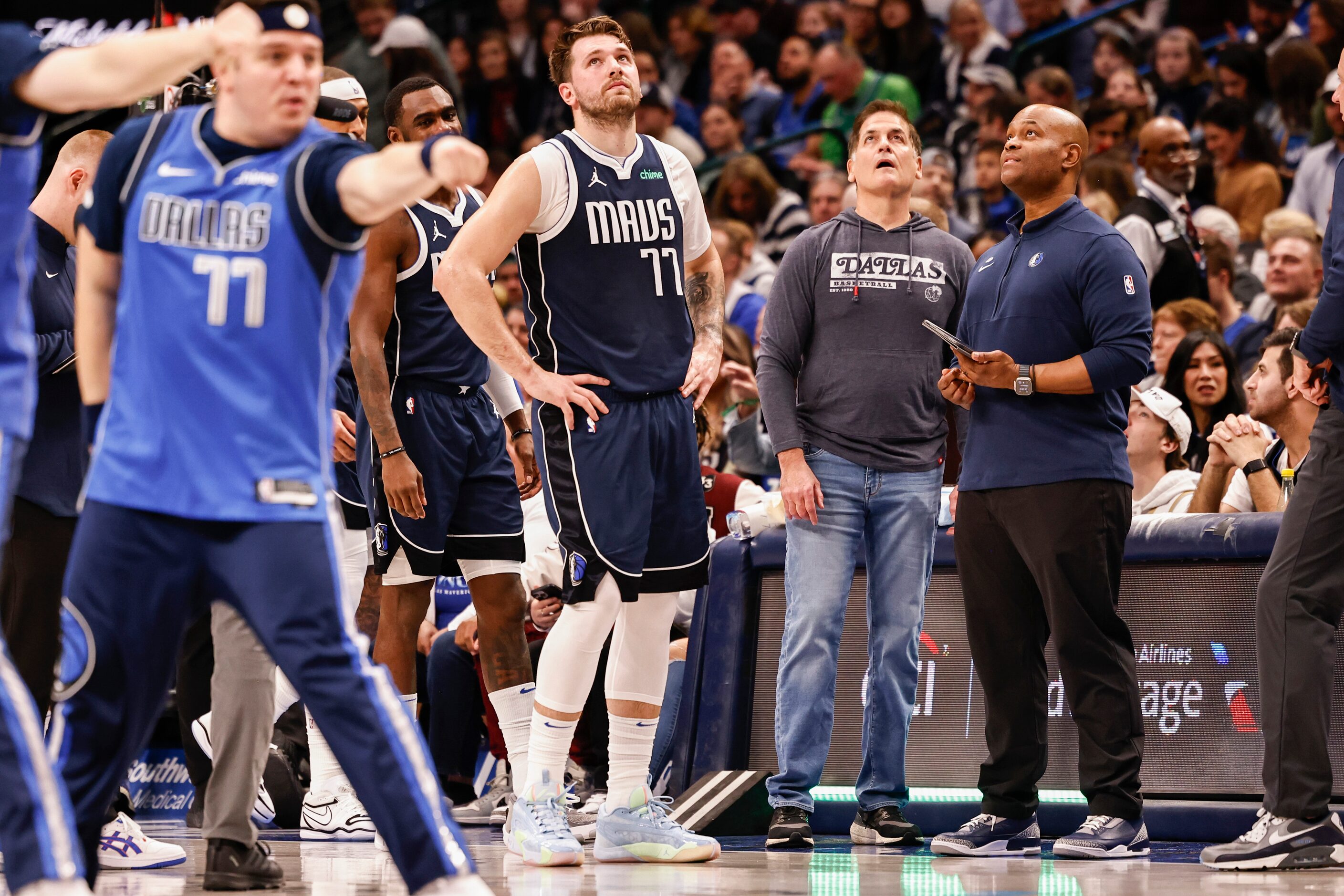 Dallas Mavericks guard Luka Dončić (77) and Dallas Mavericks part-time owner Mark Cuban look...