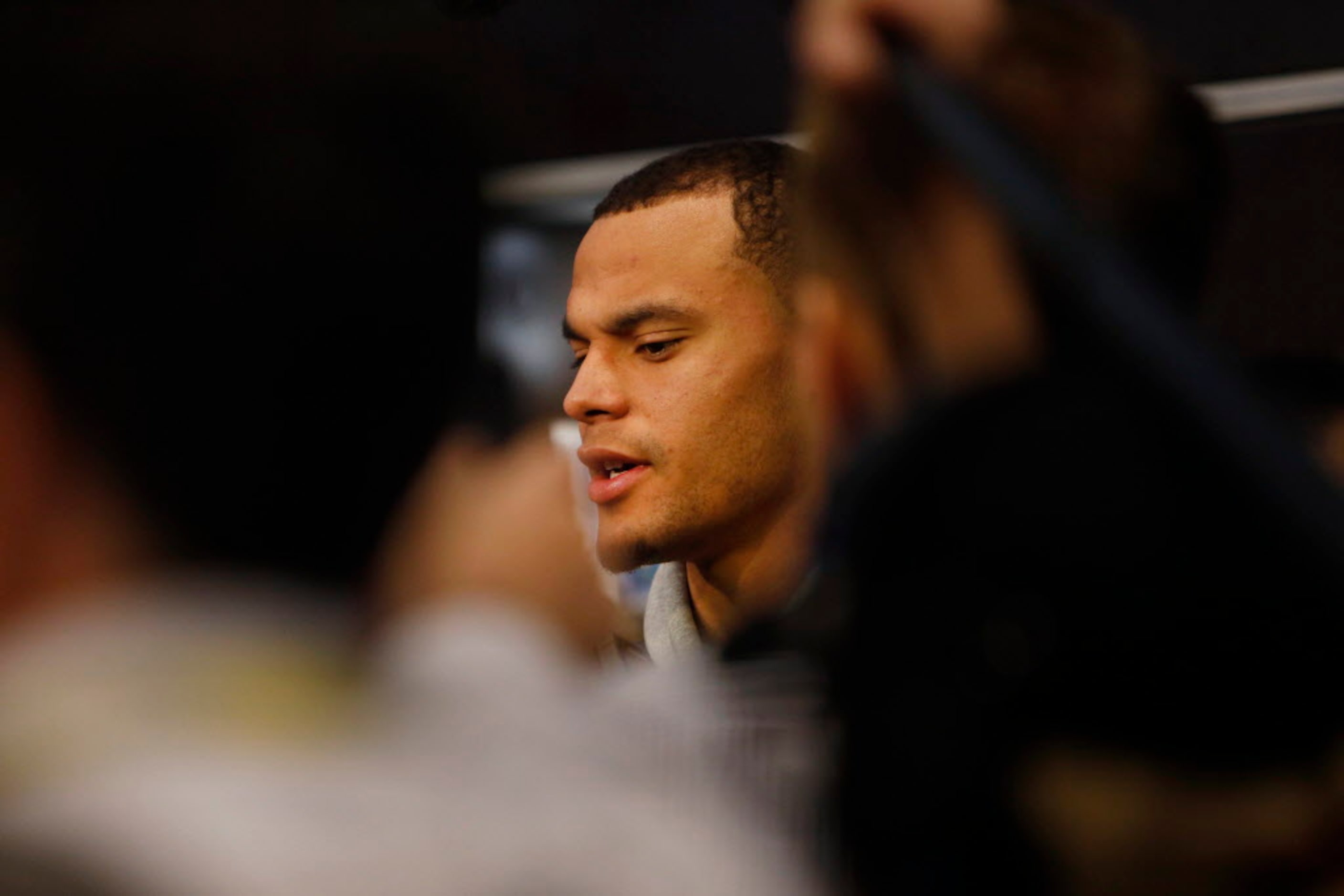 Dallas Cowboys quarterback Dak Prescott talks to the media during locker room clean out at...