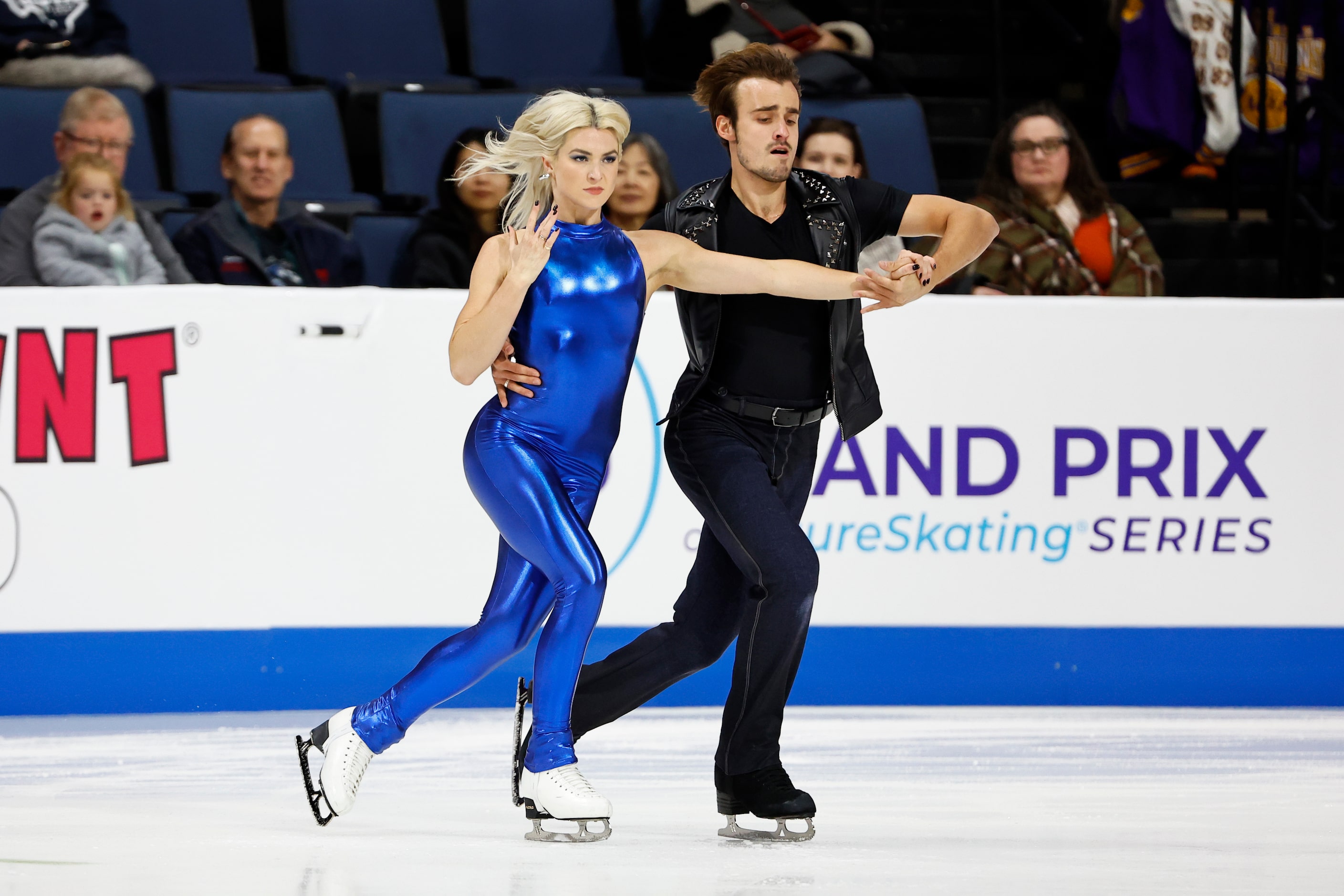 Olivia Smart and Tim Dieck, of Spain, compete in the ice dance rhythm dance program during...