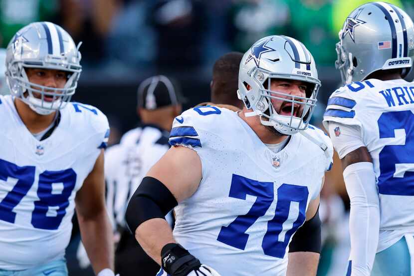 Dallas Cowboys guard Zack Martin (70) and the offense are fired up during pregame warmups...