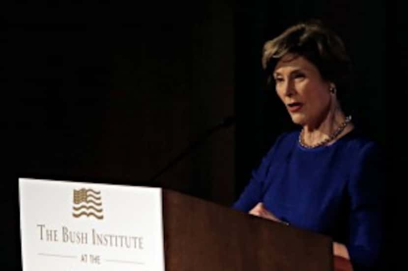  Former First Lady Laura Bush speaks to audience members as she announces "Freedom Matters!"...