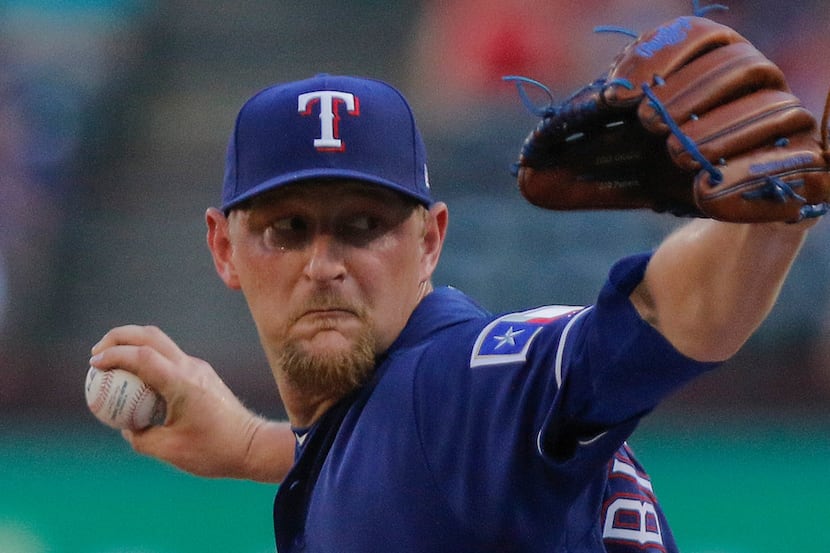 Texas Rangers relief pitcher Austin Bibens-Dirkx (56) pitches six and a third innings in his...