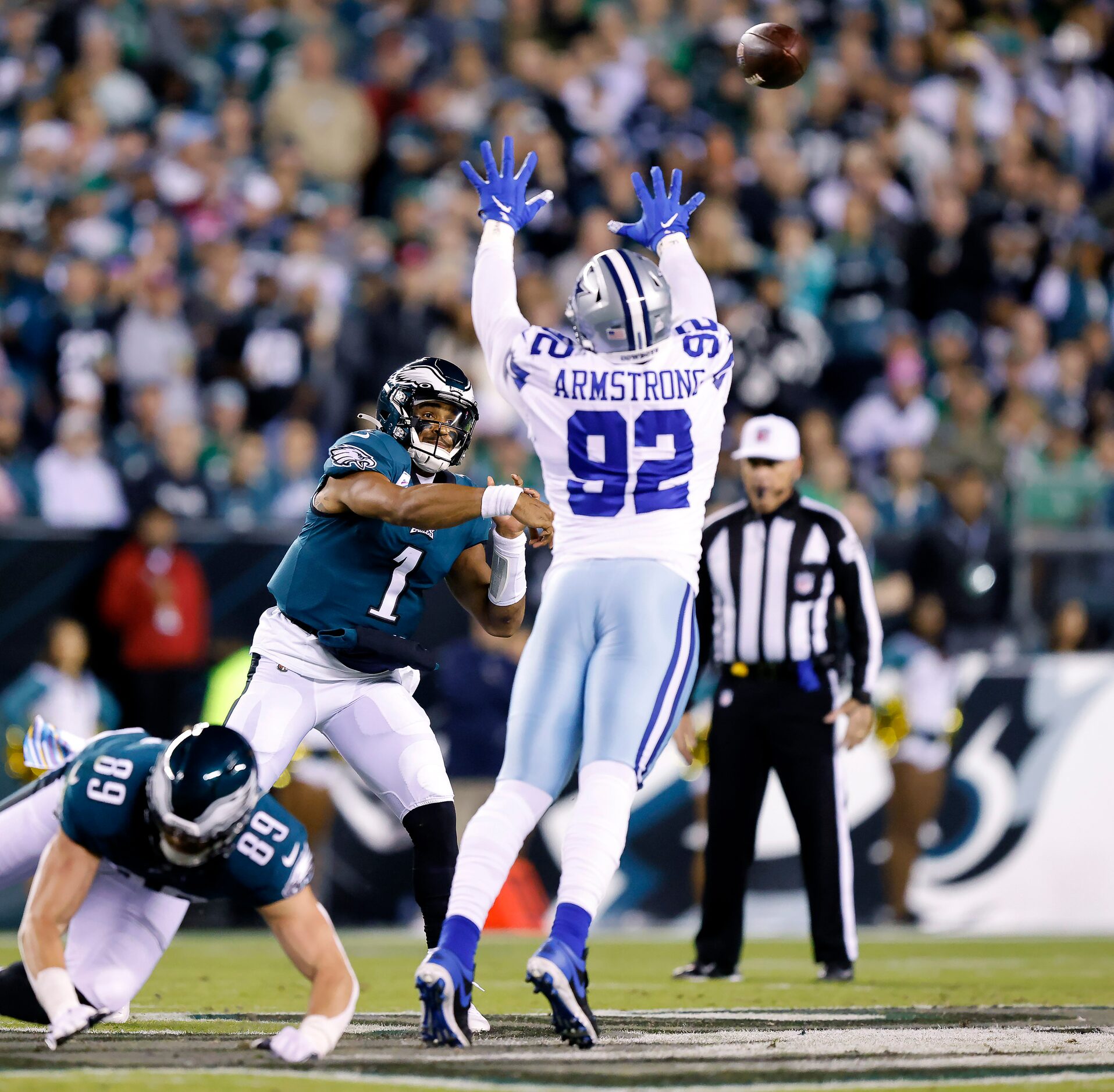 Philadelphia Eagles quarterback Jalen Hurts (1) releases a first quarter pass over Dallas...