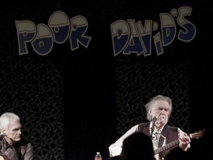 Guy Clark, right, and Vernon Thompson perform at Poor David's Pub in Dallas in 2012.