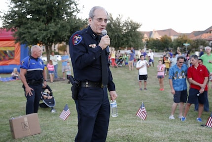 Plano Police Chief Greg Rushin discussed home safety issues at the National Night Out event...