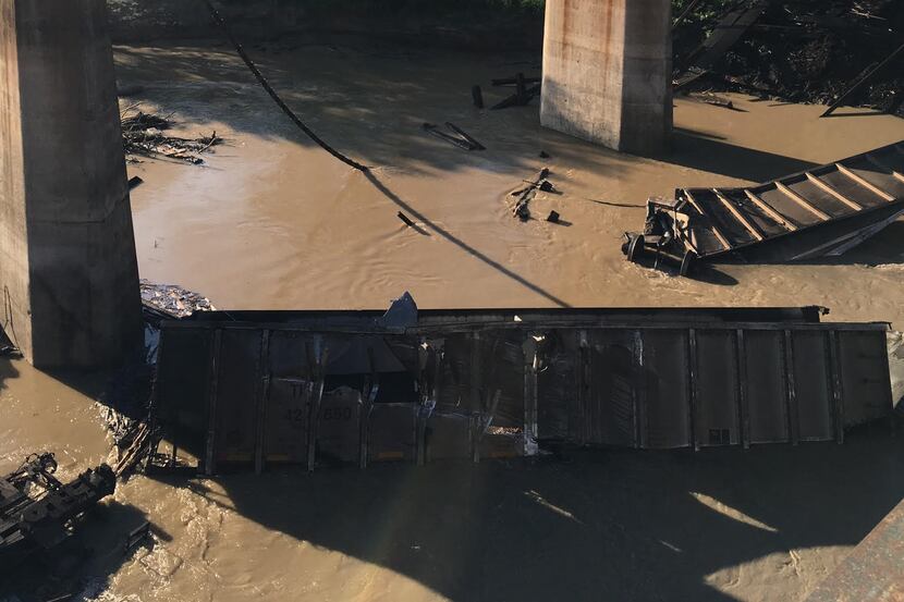 Five Union Pacific train cars fell into Denton Creek on Aug. 21 after a derailment. 